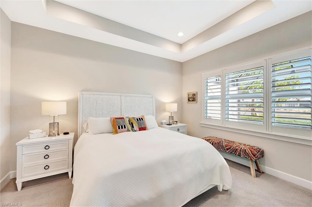 5743 Highbourne Drive Naples, FL 34113 - Photo 24 of 27 a bedroom with a bed and a window