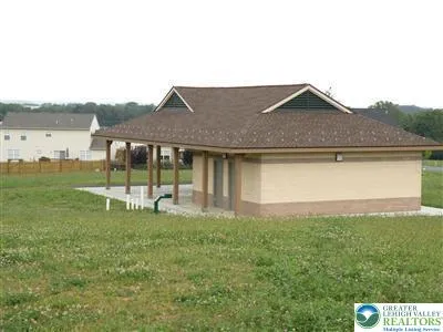 a house view with a garden space