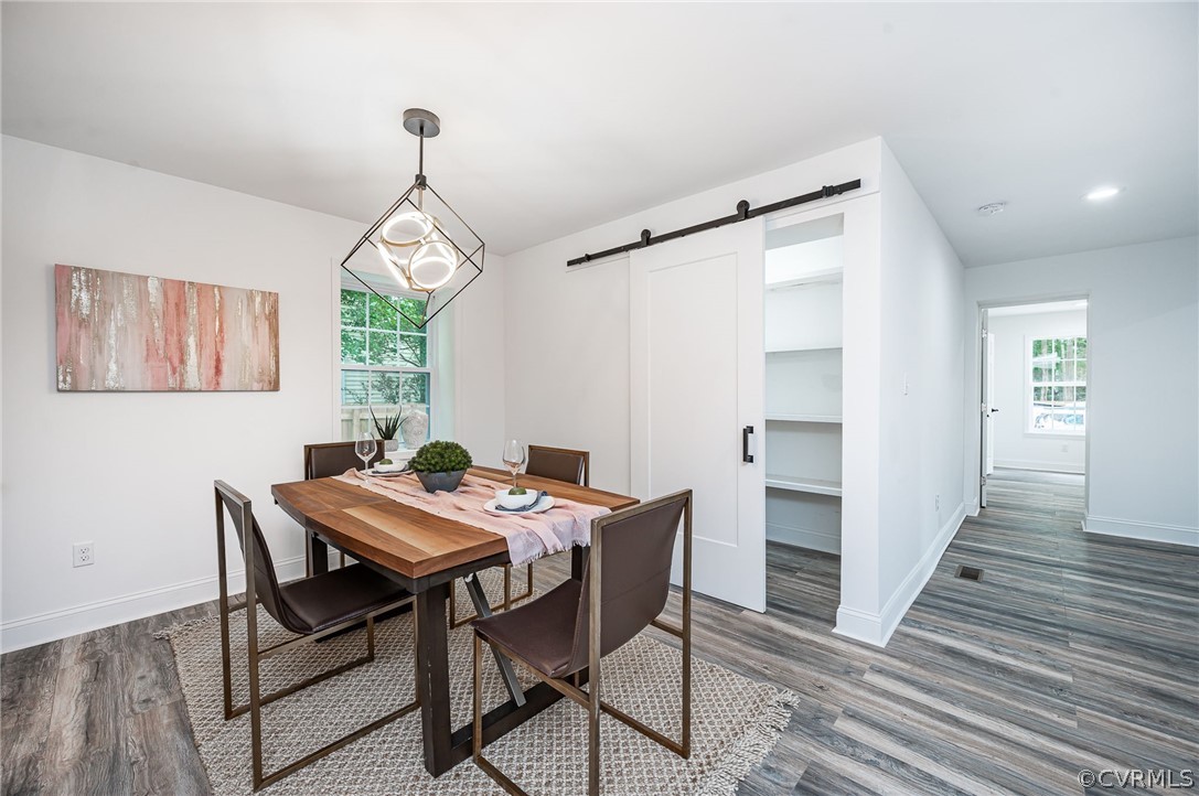 217 Henry Clay Road Ashland, VA 23005 - Photo 14 of 38 a view of a dining room with furniture window and wooden floor