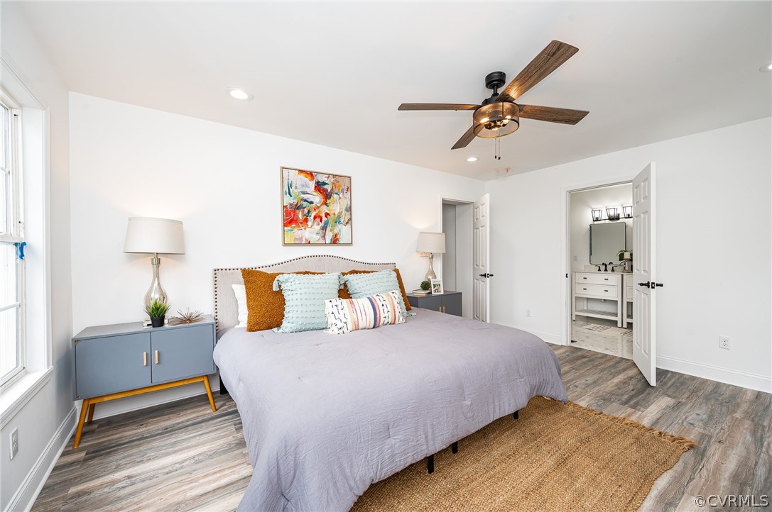 217 Henry Clay Road Ashland, VA 23005 - Photo 20 of 38 a bedroom with a bed and a chandelier