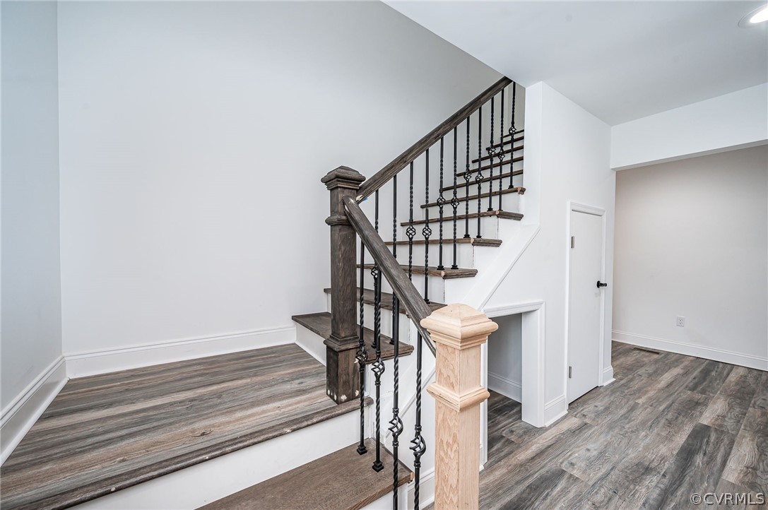 217 Henry Clay Road Ashland, VA 23005 - Photo 25 of 38 a view of staircase with wooden floor and white walls