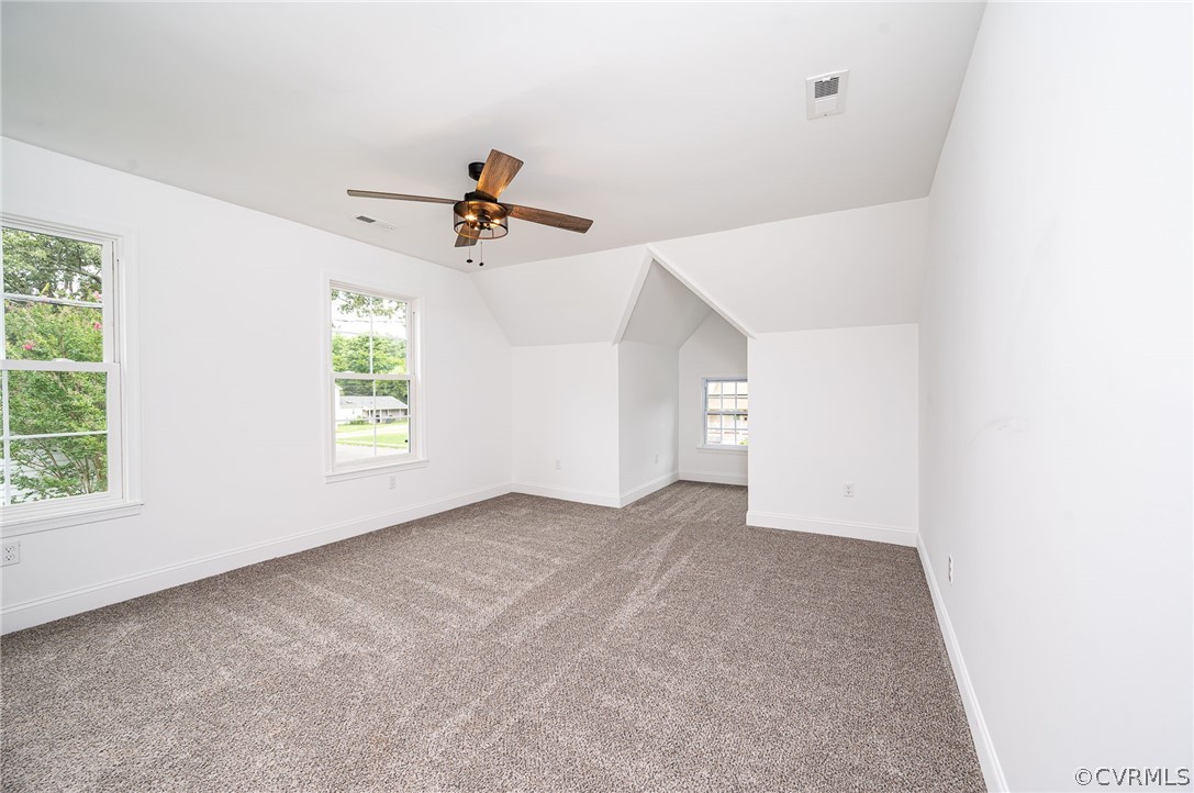 217 Henry Clay Road Ashland, VA 23005 - Photo 32 of 38 an empty room with windows and ceiling fan