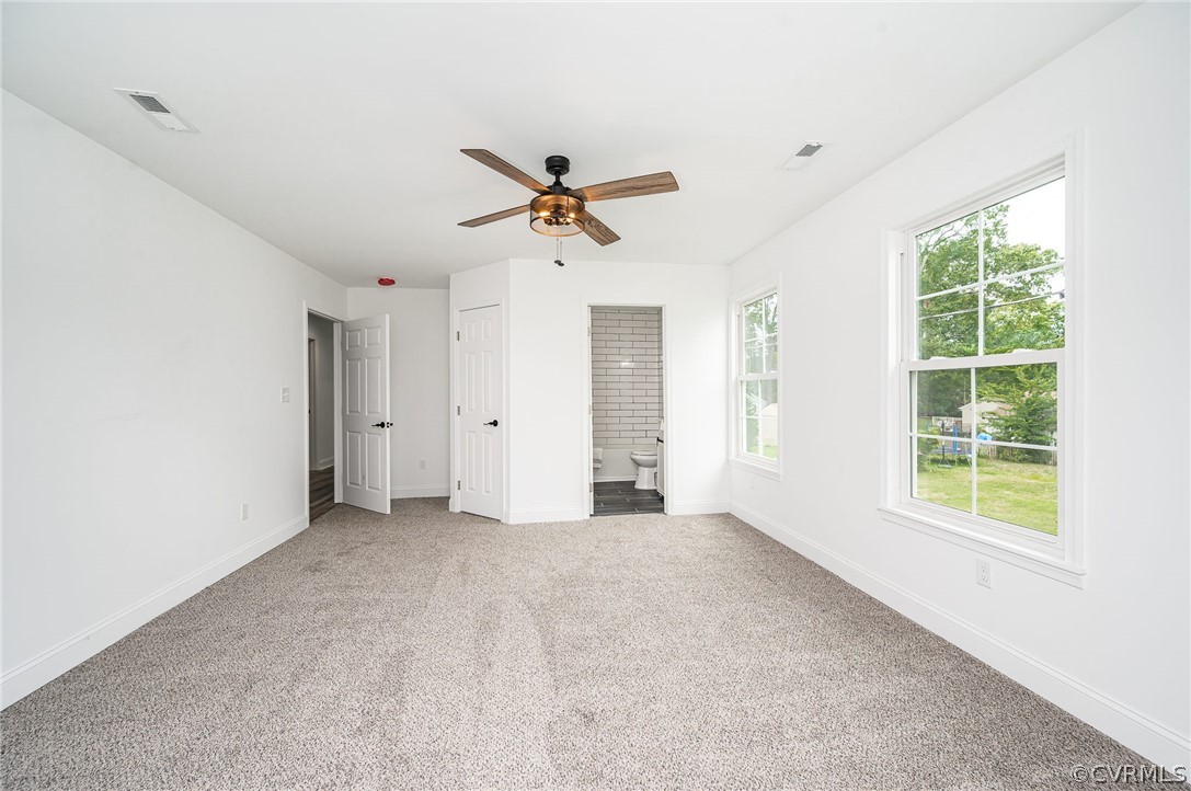 217 Henry Clay Road Ashland, VA 23005 - Photo 33 of 38 wooden floor in an empty room with a window