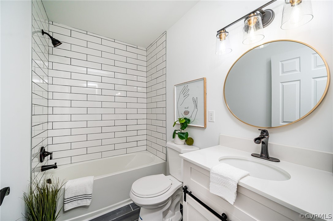 217 Henry Clay Road Ashland, VA 23005 - Photo 34 of 38 a bathroom with a sink toilet and shower