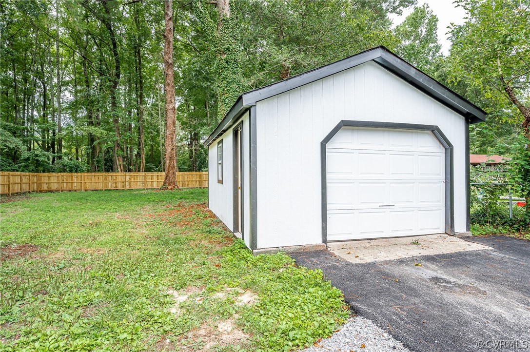 217 Henry Clay Road Ashland, VA 23005 - Photo 36 of 38 a view of backyard of house with garage