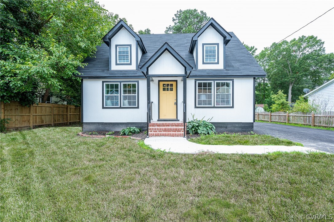 217 Henry Clay Road Ashland, VA 23005 - Photo 38 of 38 a front view of a house with a yard