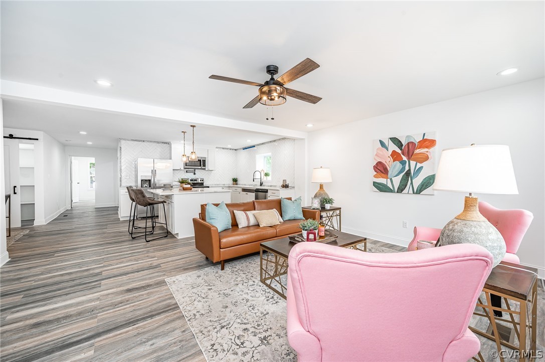 217 Henry Clay Road Ashland, VA 23005 - Photo 5 of 38 a living room with furniture and a wooden floor