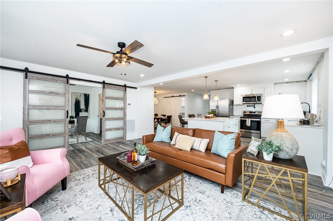 217 Henry Clay Road Ashland, VA 23005 - Photo 8 of 38 a living room with furniture and kitchen view