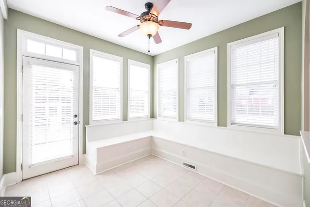 a spacious bathroom with a bathtub and a shower