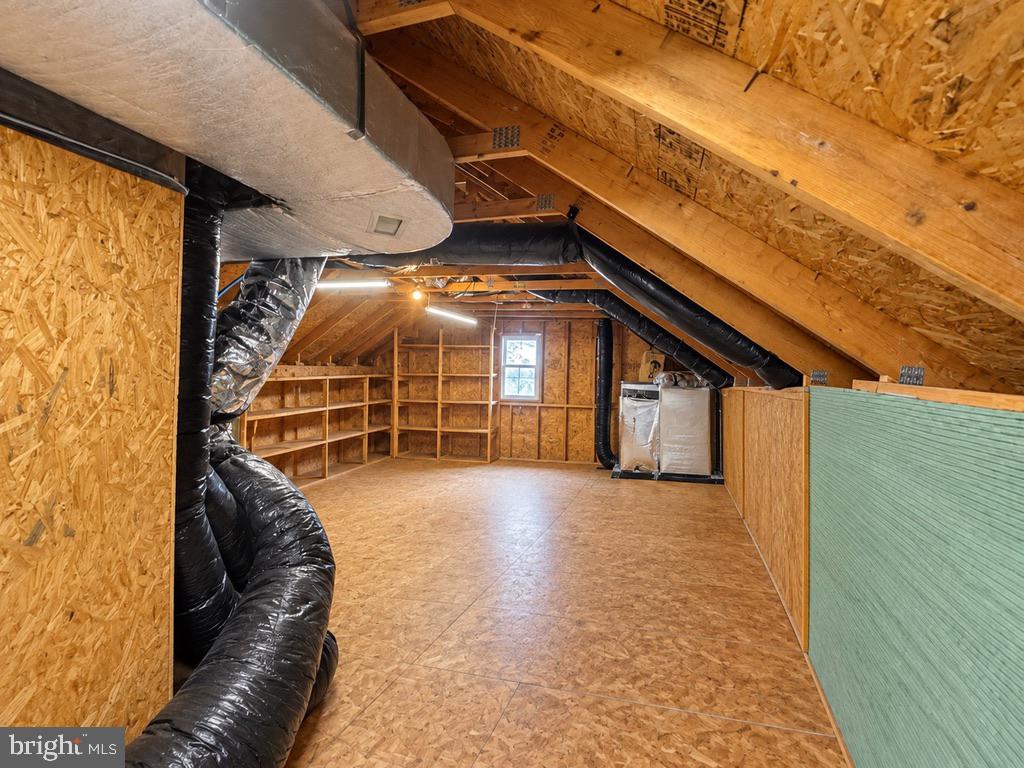 212 Gilmer Road Coatesville, PA 19320 - Photo 19 of 27 Expansive Storage Loft over the Garage