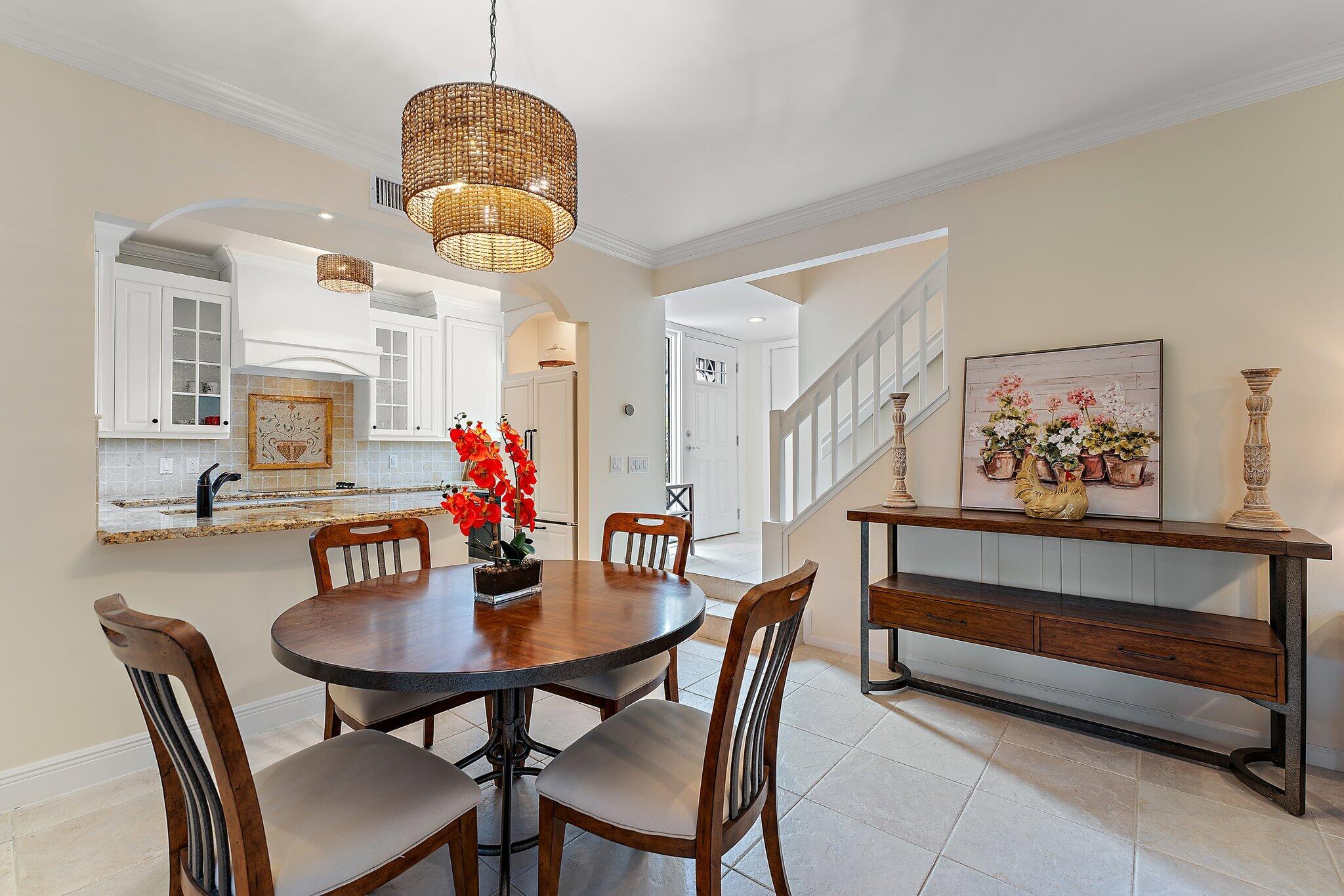 2905 Fairway Drive North Jupiter, FL 33477 - Photo 15 of 65 a dining room with furniture and window