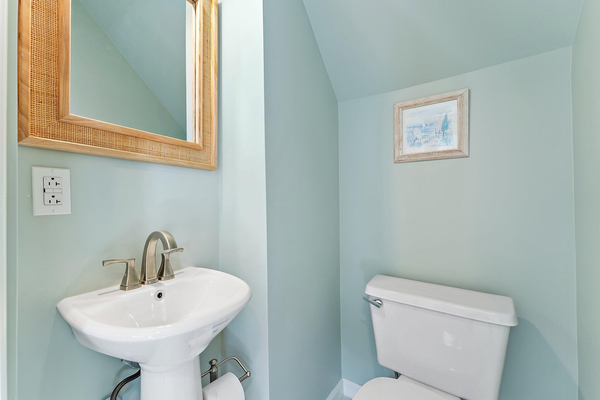 2905 Fairway Drive North Jupiter, FL 33477 - Photo 38 of 65 a bathroom with a sink mirror and toilet