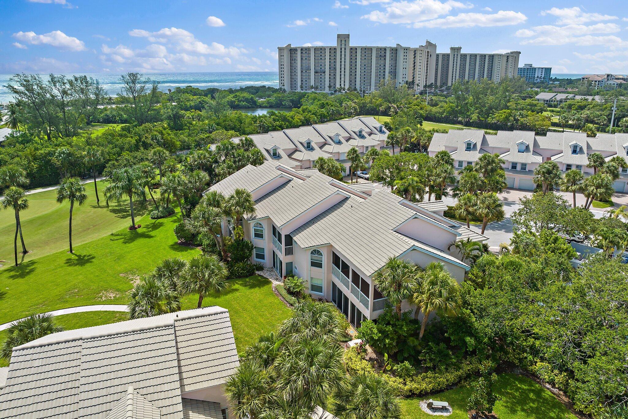 2905 Fairway Drive North Jupiter, FL 33477 - Photo 49 of 65 a view of a garden with a houses