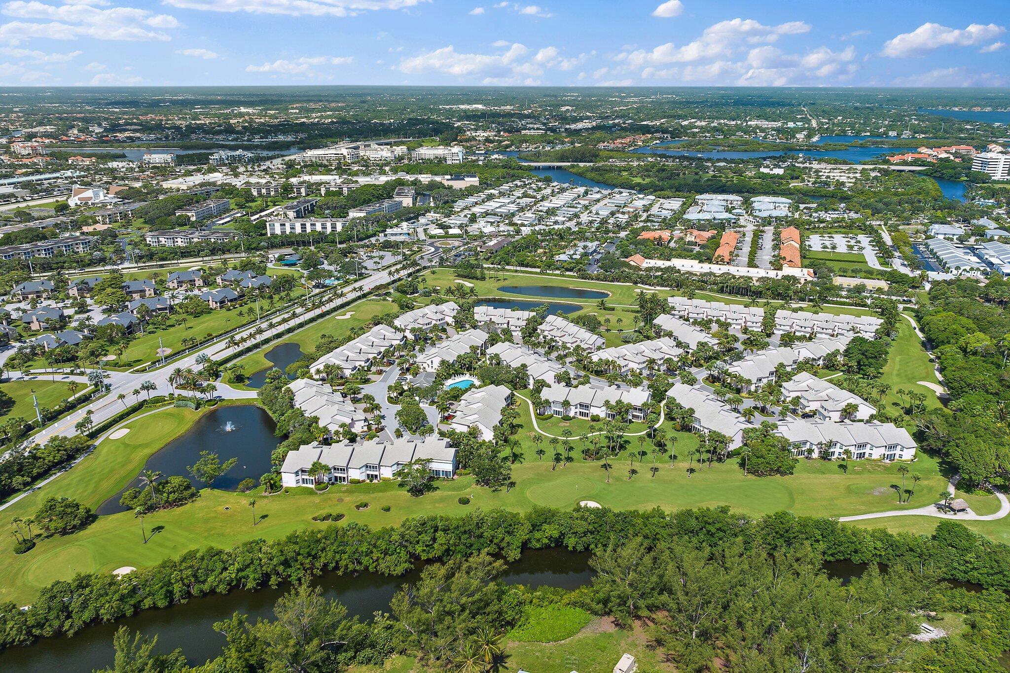 2905 Fairway Drive North Jupiter, FL 33477 - Photo 59 of 65 an aerial view of residential houses with outdoor space and street view