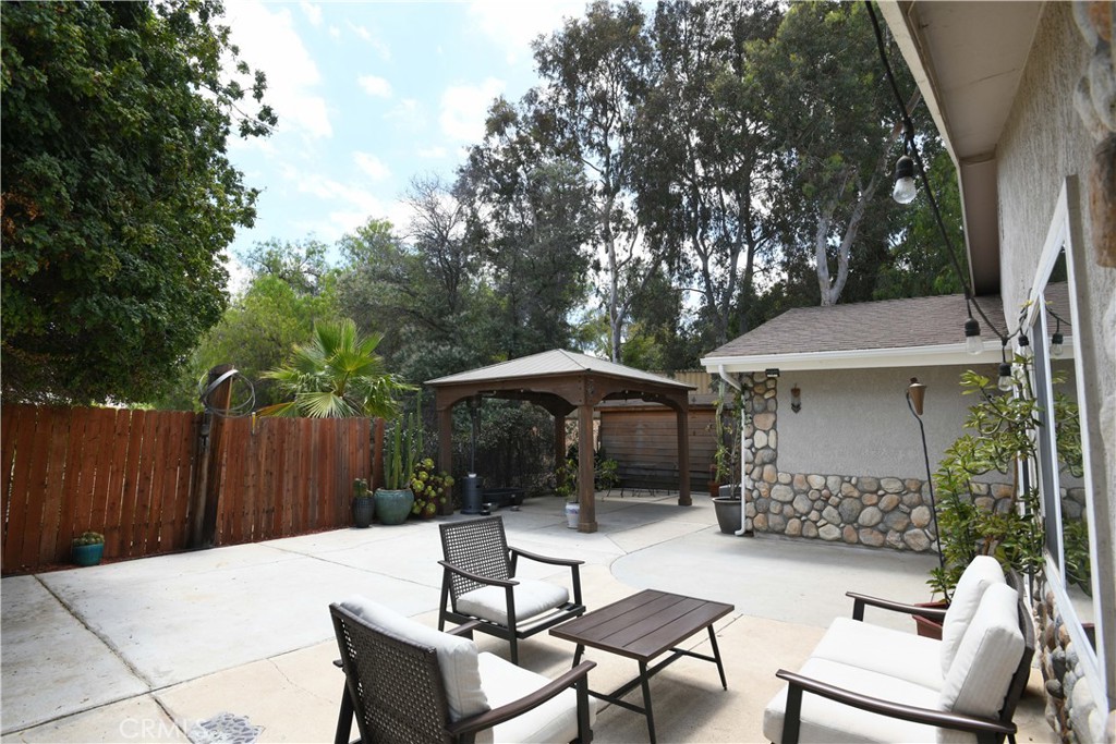 17371 Mockingbird Canyon Road Riverside, CA 92504 - Photo 7 of 40 Rear Patio area