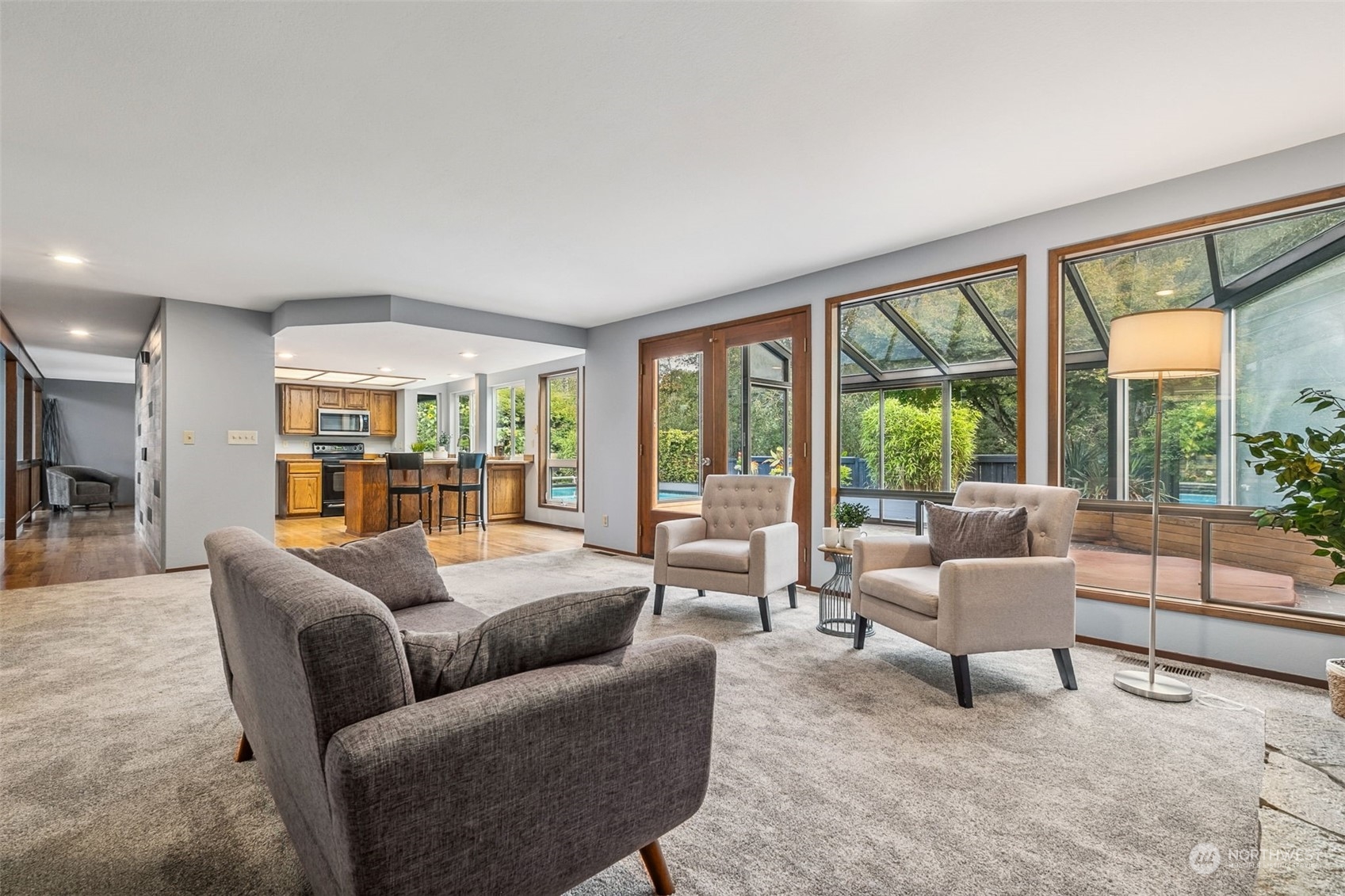 16902 161st Avenue Southeast Renton, WA 98058 - Photo 11 of 29 a living room with furniture and a large window
