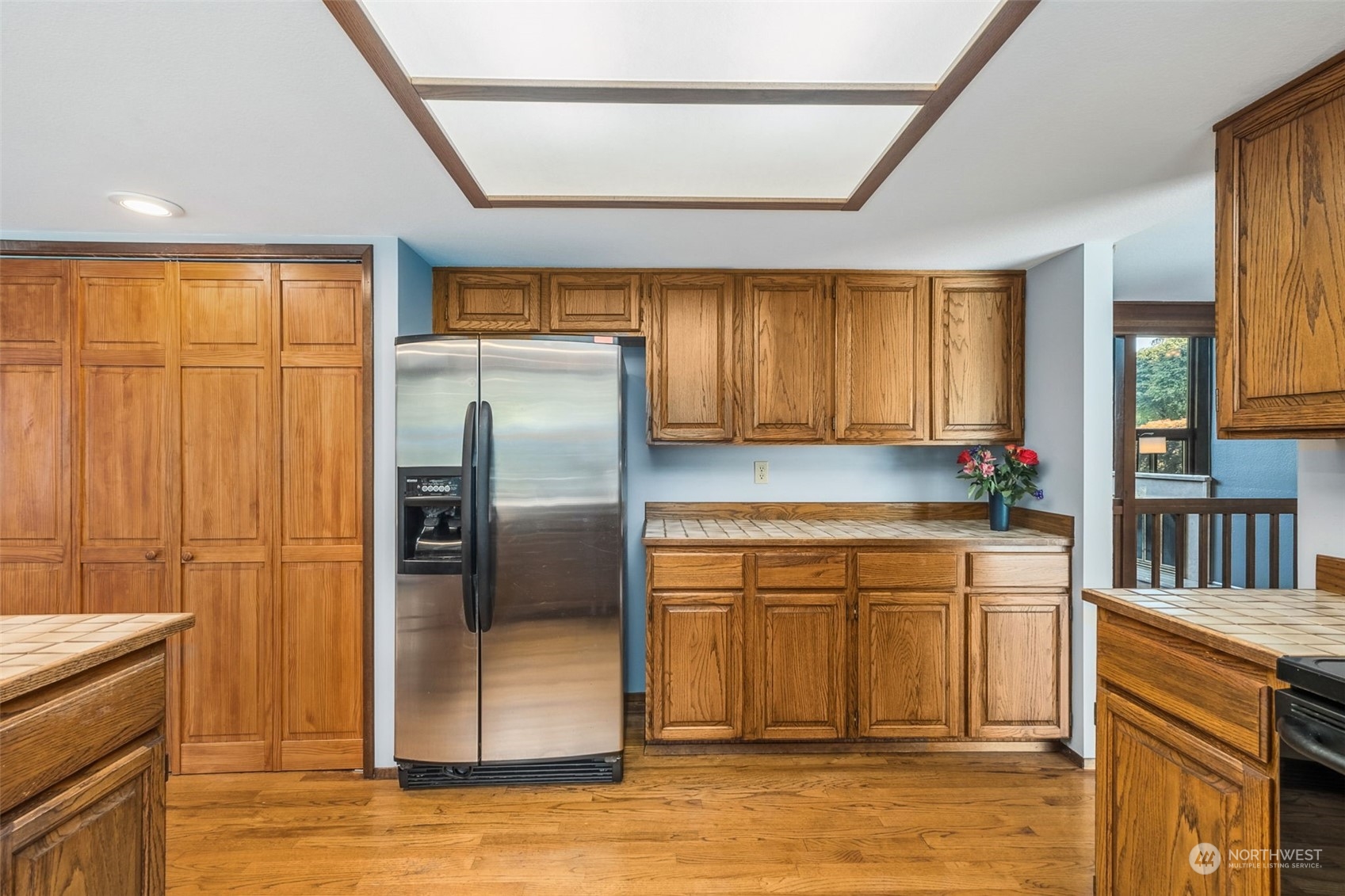 16902 161st Avenue Southeast Renton, WA 98058 - Photo 15 of 29 a kitchen with stainless steel appliances granite countertop a refrigerator a sink and dishwasher