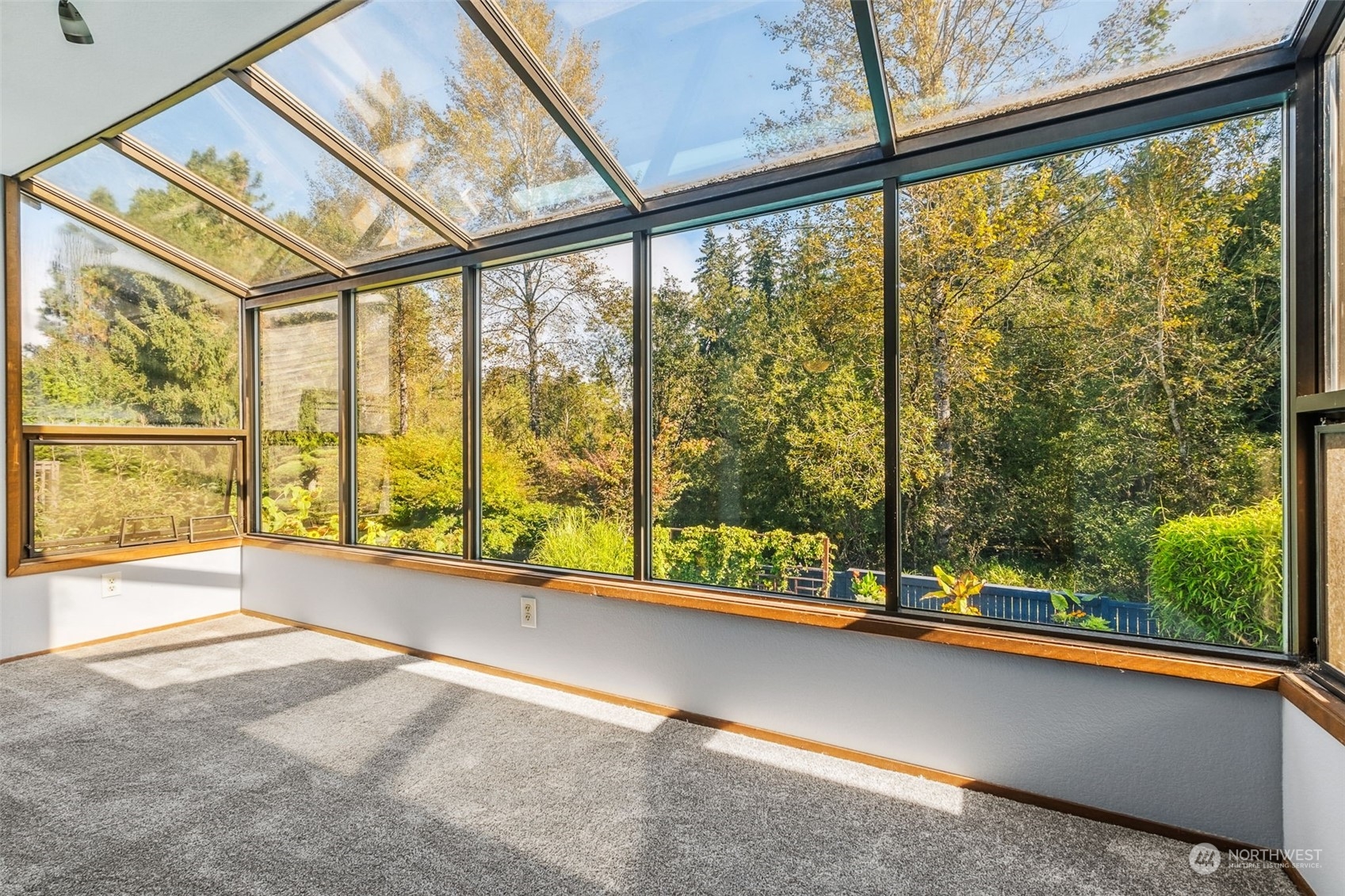 16902 161st Avenue Southeast Renton, WA 98058 - Photo 18 of 29 a view of an empty room with a window