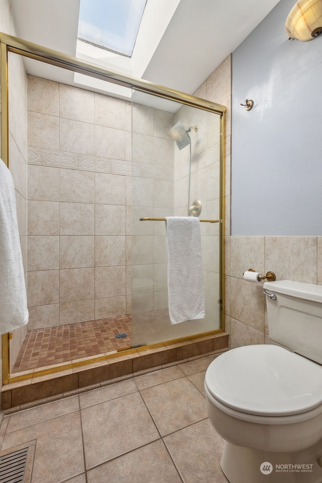 16902 161st Avenue Southeast Renton, WA 98058 - Photo 20 of 29 a bathroom with a toilet and a shower