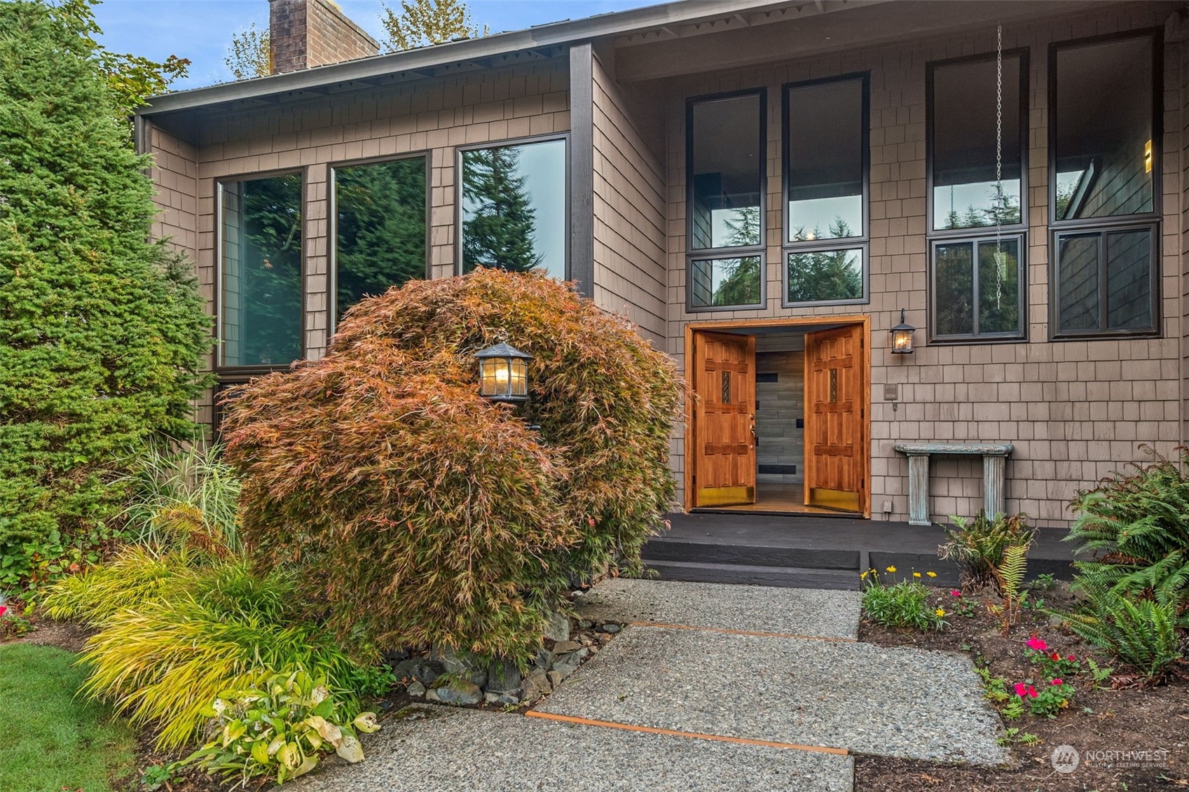 16902 161st Avenue Southeast Renton, WA 98058 - Photo 2 of 29 a front view of a house with garden