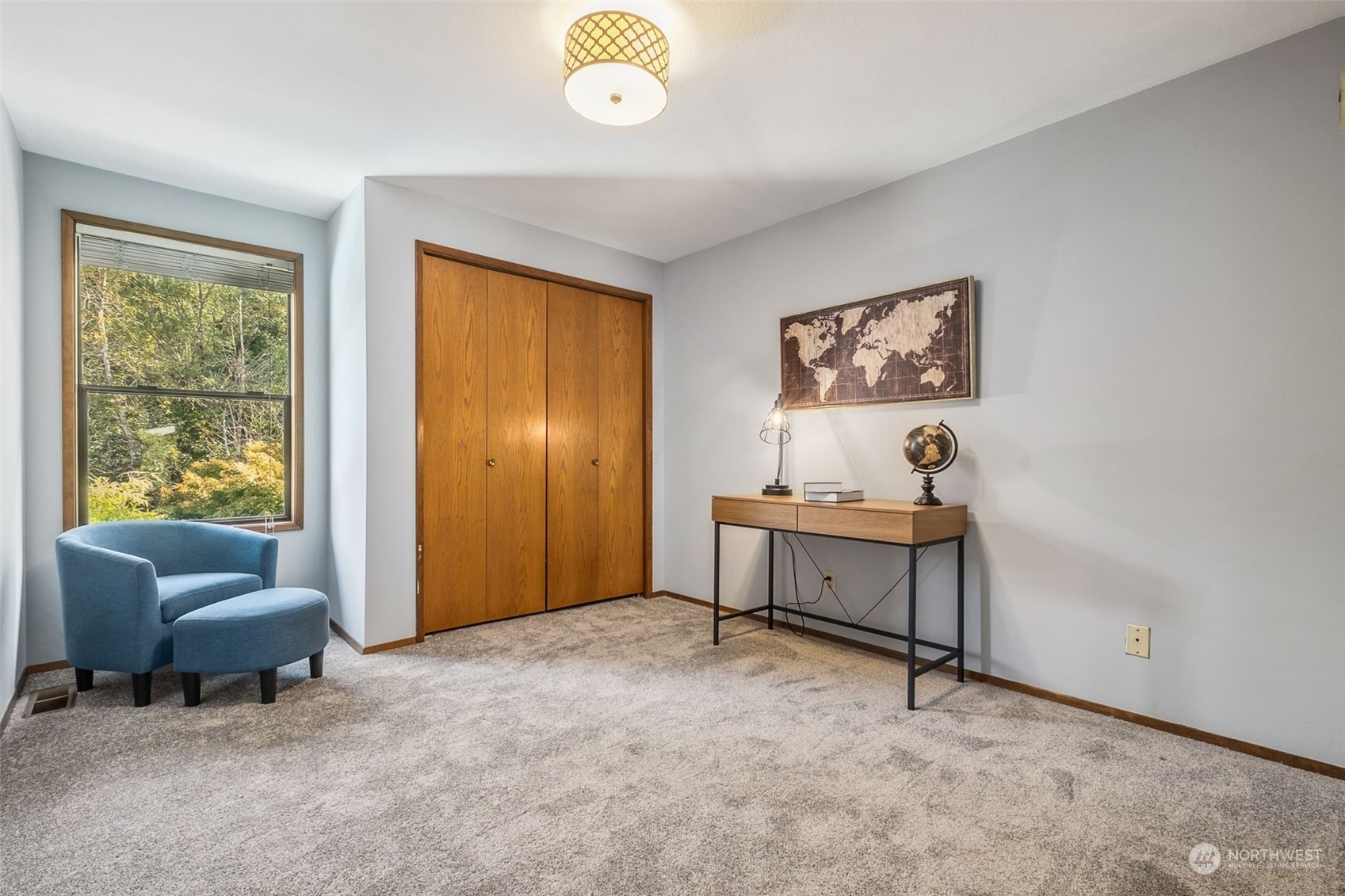 16902 161st Avenue Southeast Renton, WA 98058 - Photo 26 of 29 a room with furniture and a window