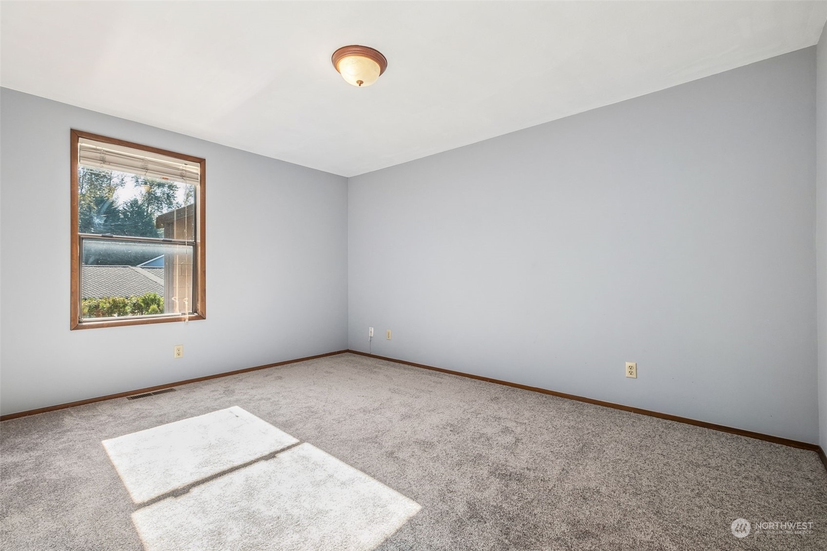 16902 161st Avenue Southeast Renton, WA 98058 - Photo 28 of 29 an empty room with windows