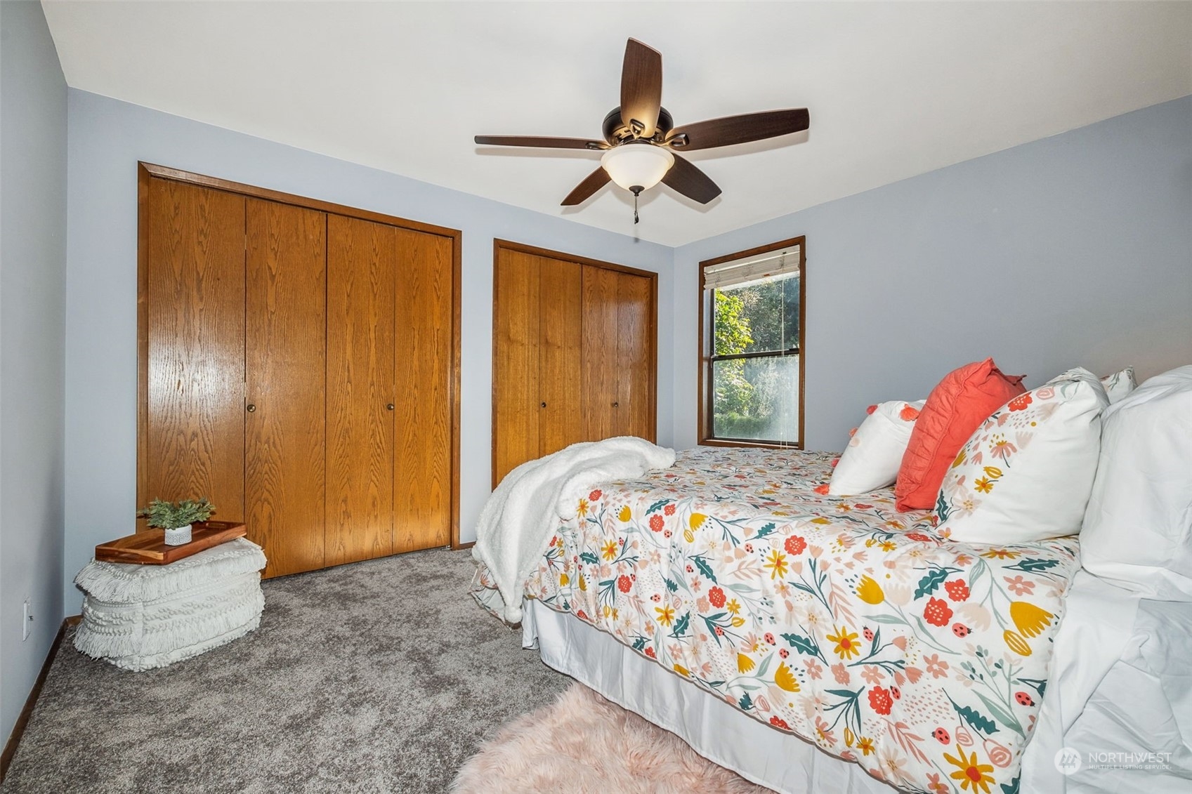 16902 161st Avenue Southeast Renton, WA 98058 - Photo 29 of 29 a bedroom with a bed and a chandelier