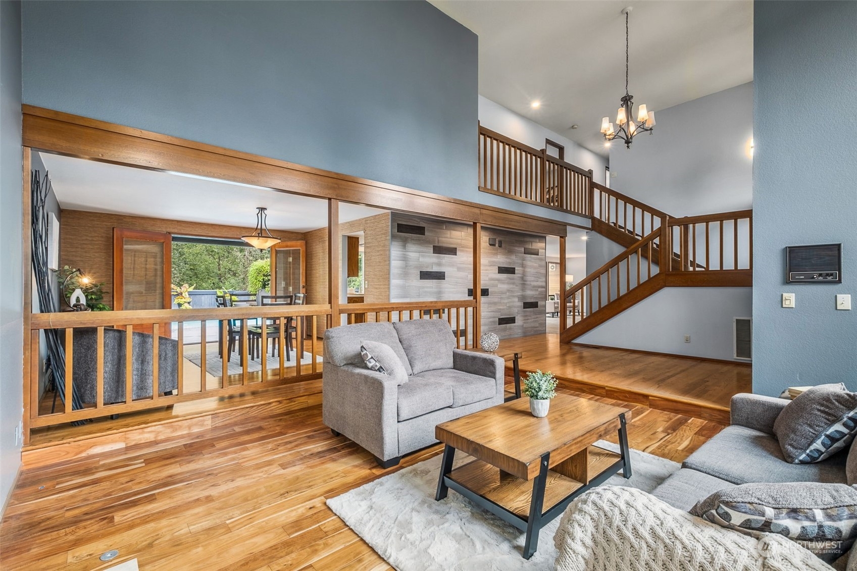 16902 161st Avenue Southeast Renton, WA 98058 - Photo 4 of 29 a living room with furniture and a table