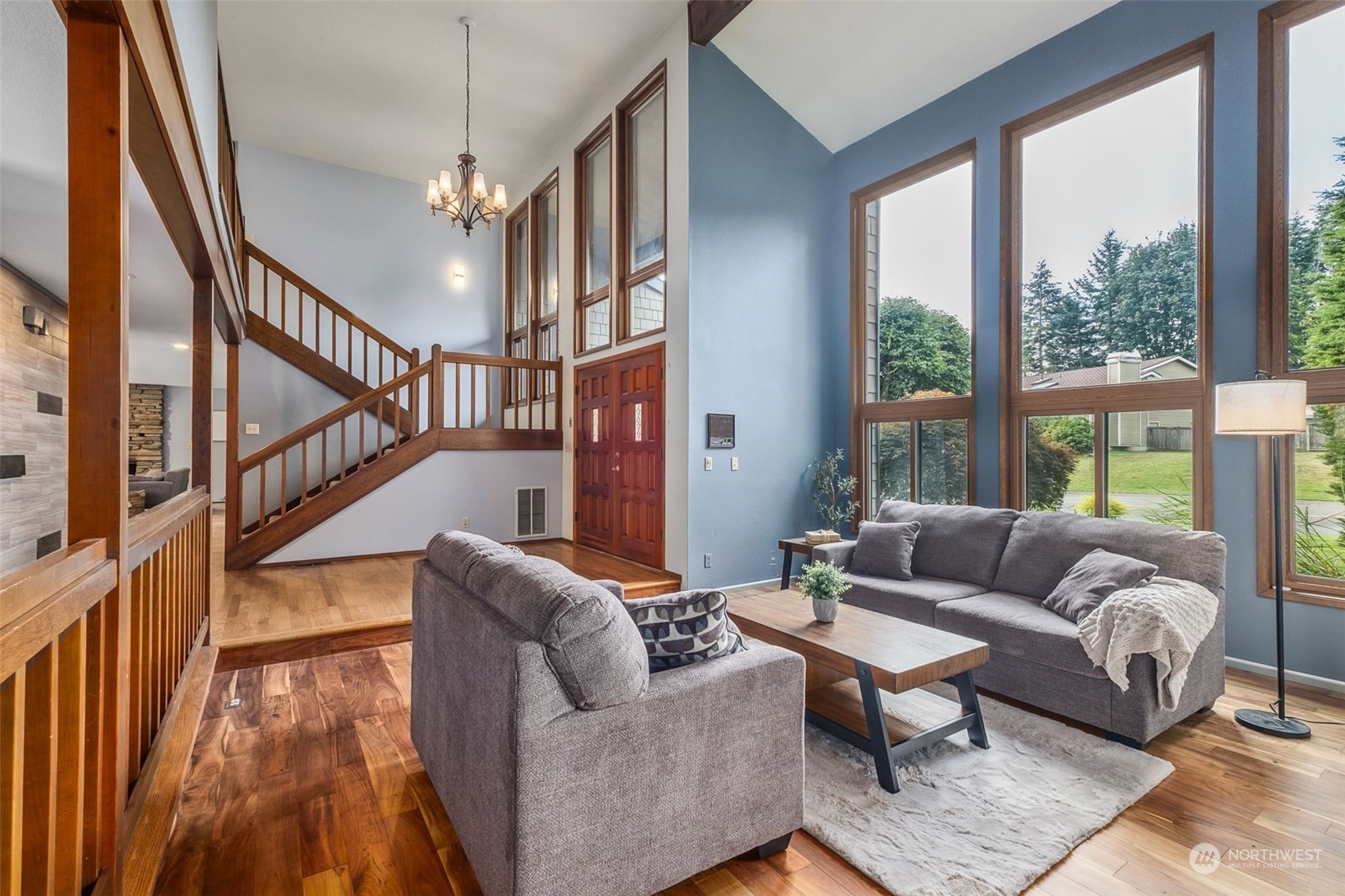 16902 161st Avenue Southeast Renton, WA 98058 - Photo 5 of 29 a living room with furniture and a table