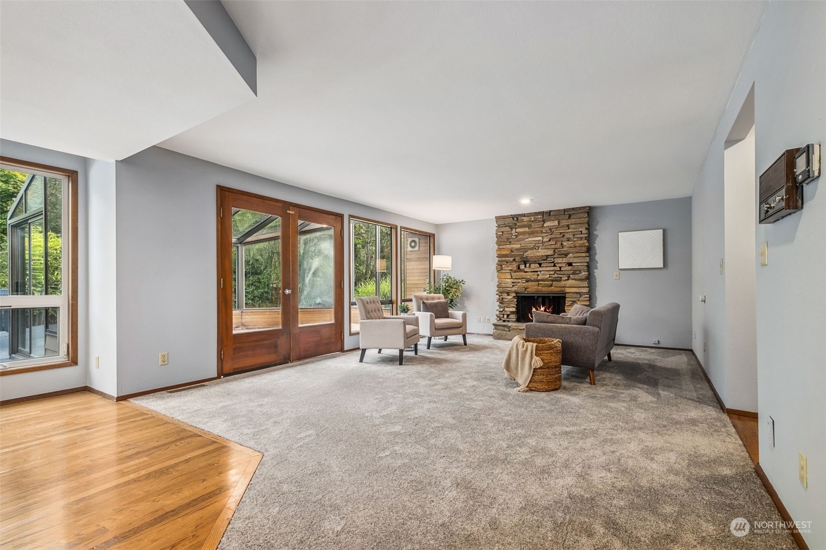 16902 161st Avenue Southeast Renton, WA 98058 - Photo 9 of 29 a view of a livingroom with lounge chair and a large window