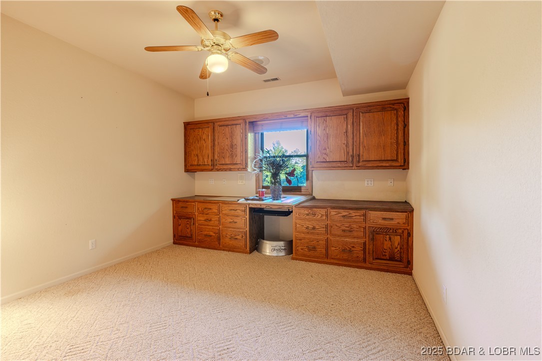 270 Country Club Shores Road Camdenton, MO 65020 - Photo 15 of 26 Wet bar downstairs.