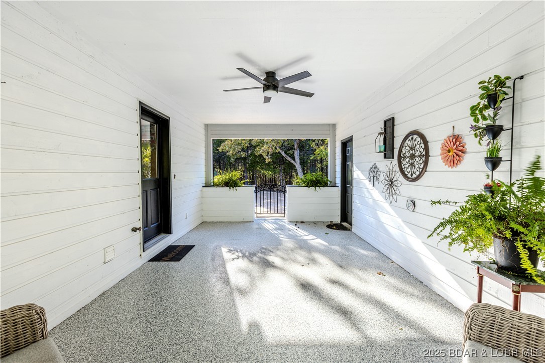 270 Country Club Shores Road Camdenton, MO 65020 - Photo 17 of 26 Covered breezeway make for a beautiful area for an