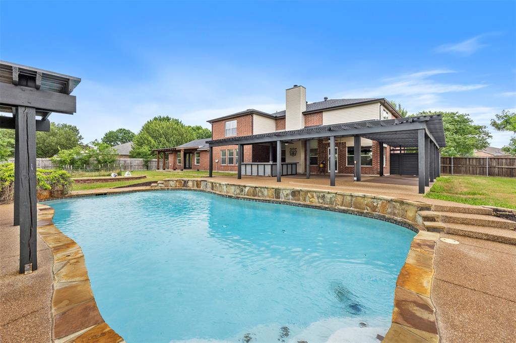 3931 Alpha Way Midlothian, TX 76065 - Photo 28 of 33 swimming pool view with a garden space