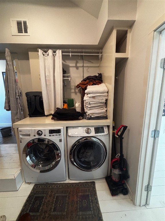 917 East 39th Street Austin, TX 78751 - Photo 15 of 27 a view of walk in closet with clothes and shoes