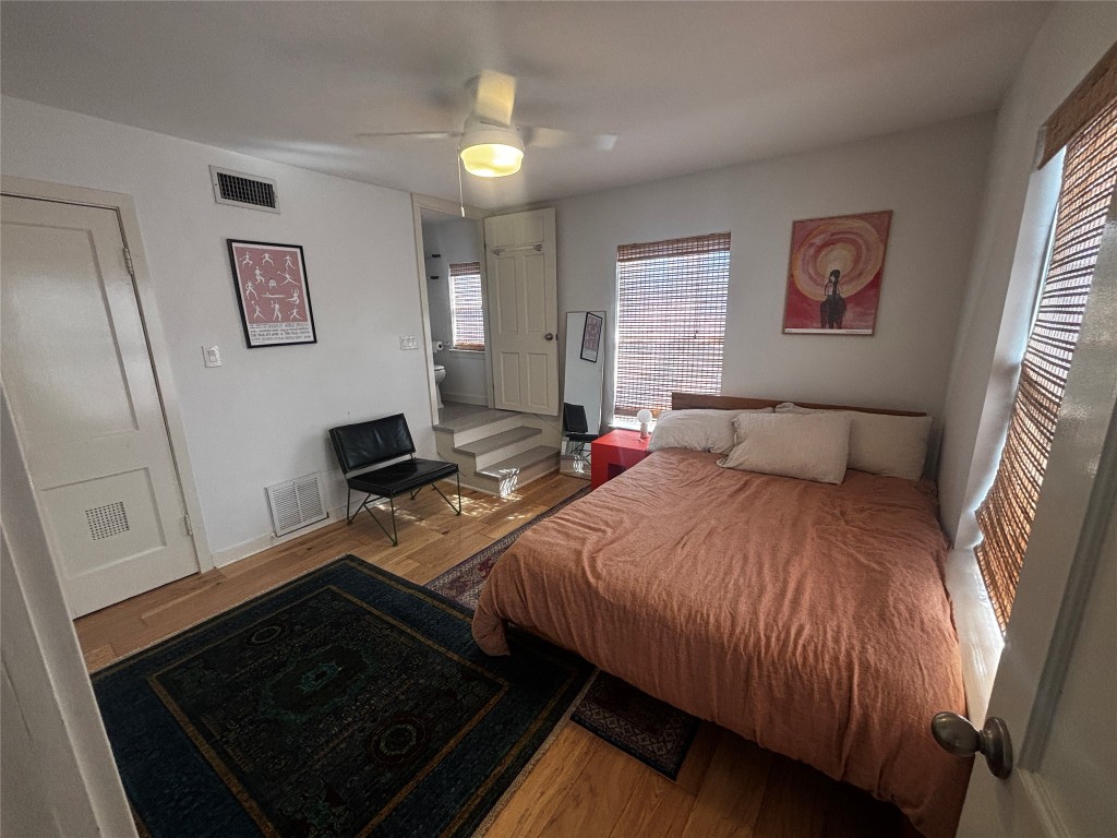 917 East 39th Street Austin, TX 78751 - Photo 2 of 27 a bedroom with a bed and a window