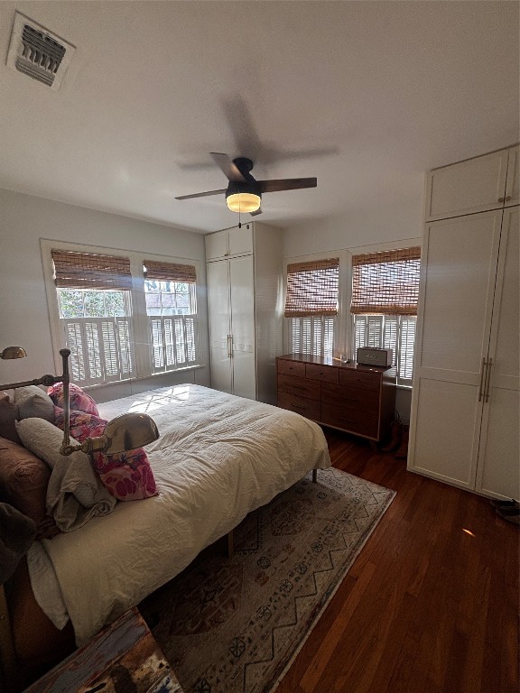 917 East 39th Street Austin, TX 78751 - Photo 3 of 27 a bed sitting in a bedroom next to a window