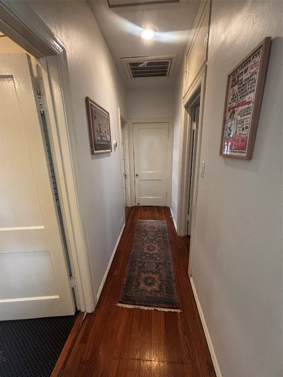 917 East 39th Street Austin, TX 78751 - Photo 5 of 27 a view of a hallway with wooden floor