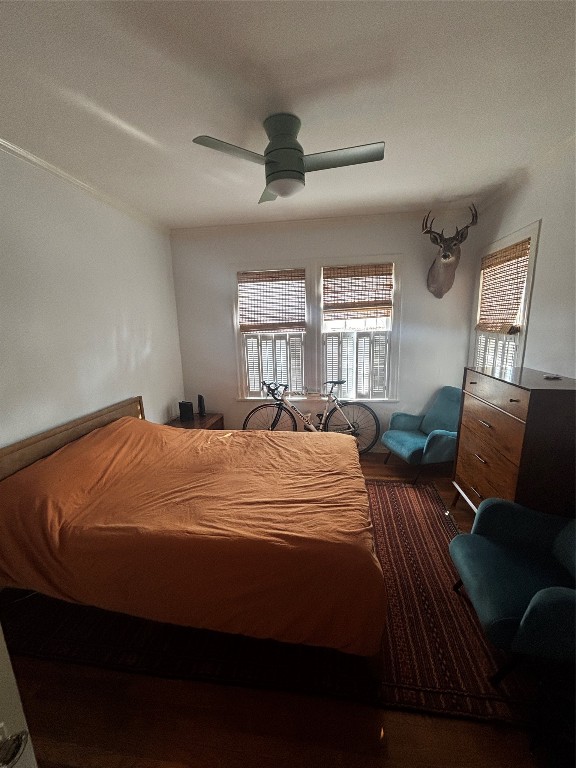 917 East 39th Street Austin, TX 78751 - Photo 6 of 27 a bed sitting in a bedroom next to a window and a dresser