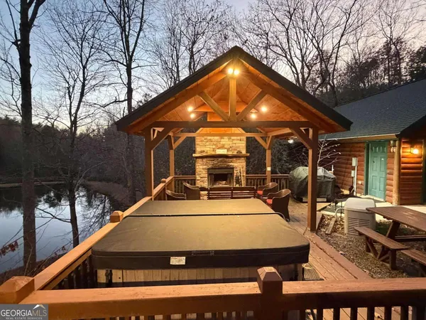 a view of outdoor space yard deck patio and fire pit
