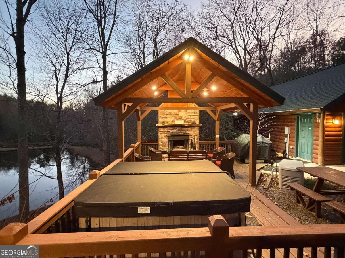 a view of outdoor space yard deck patio and fire pit