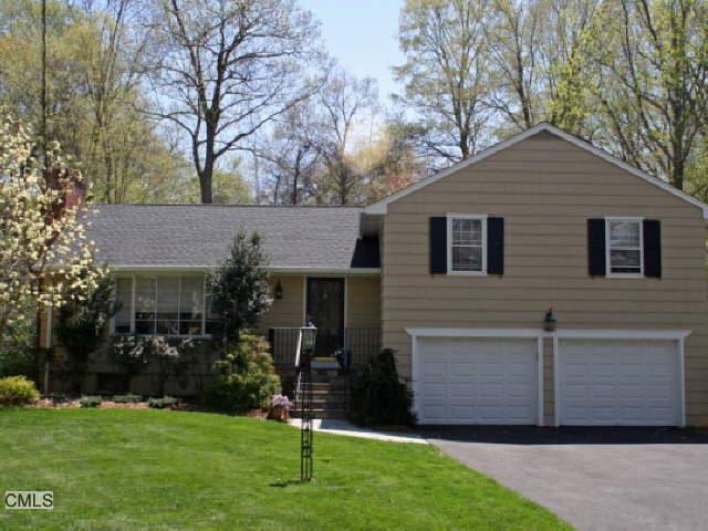 a front view of house with yard