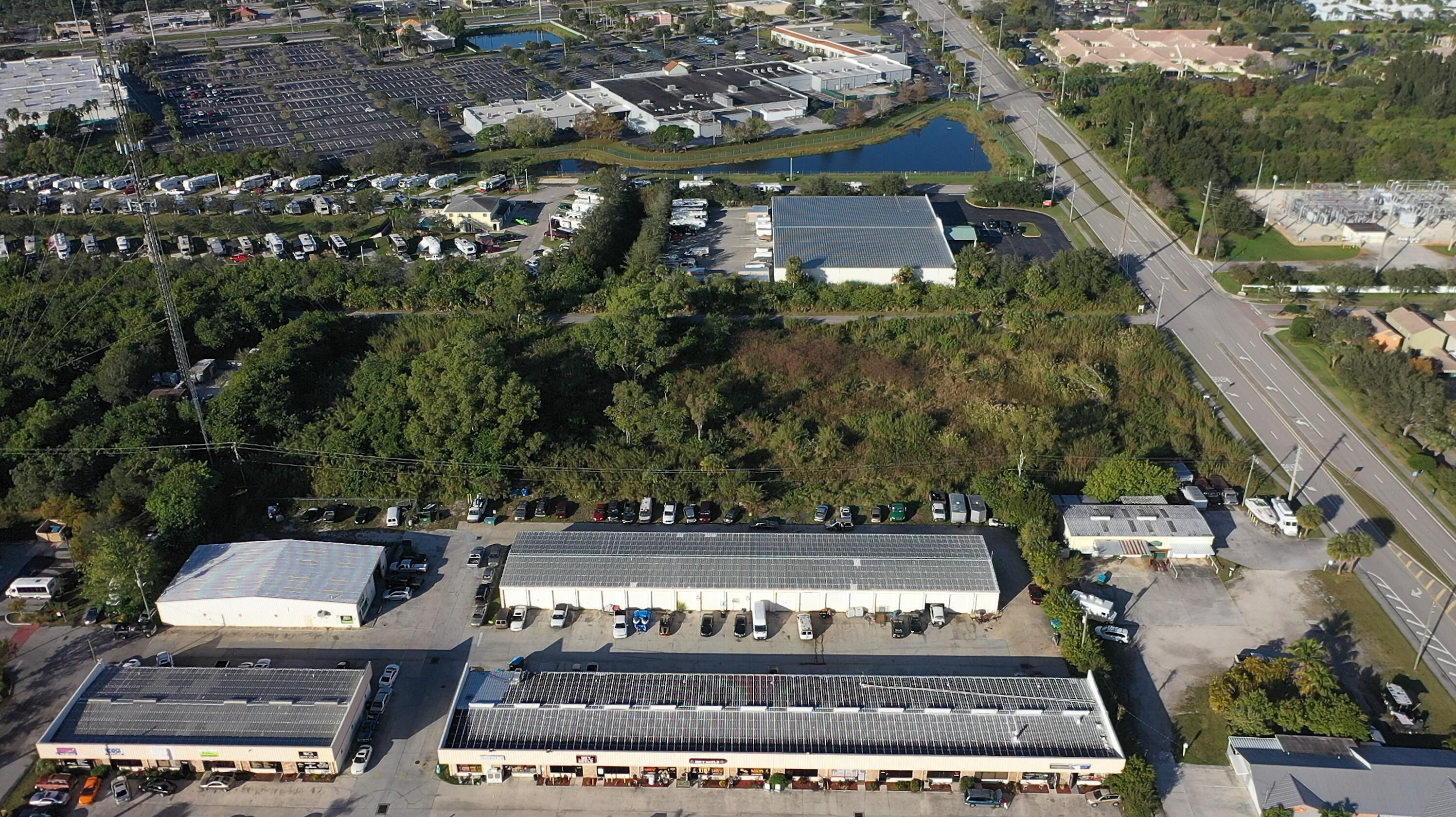 3775 Southeast Jennings Road Port St. Lucie, FL 34952 - Photo 4 of 14 a view of a yard with plants