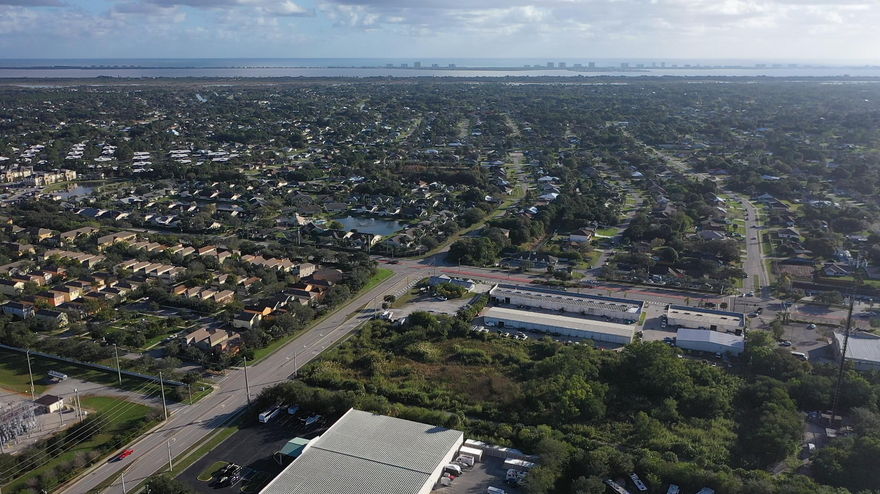 3775 Southeast Jennings Road Port St. Lucie, FL 34952 - Photo 6 of 14 an aerial view of multiple house