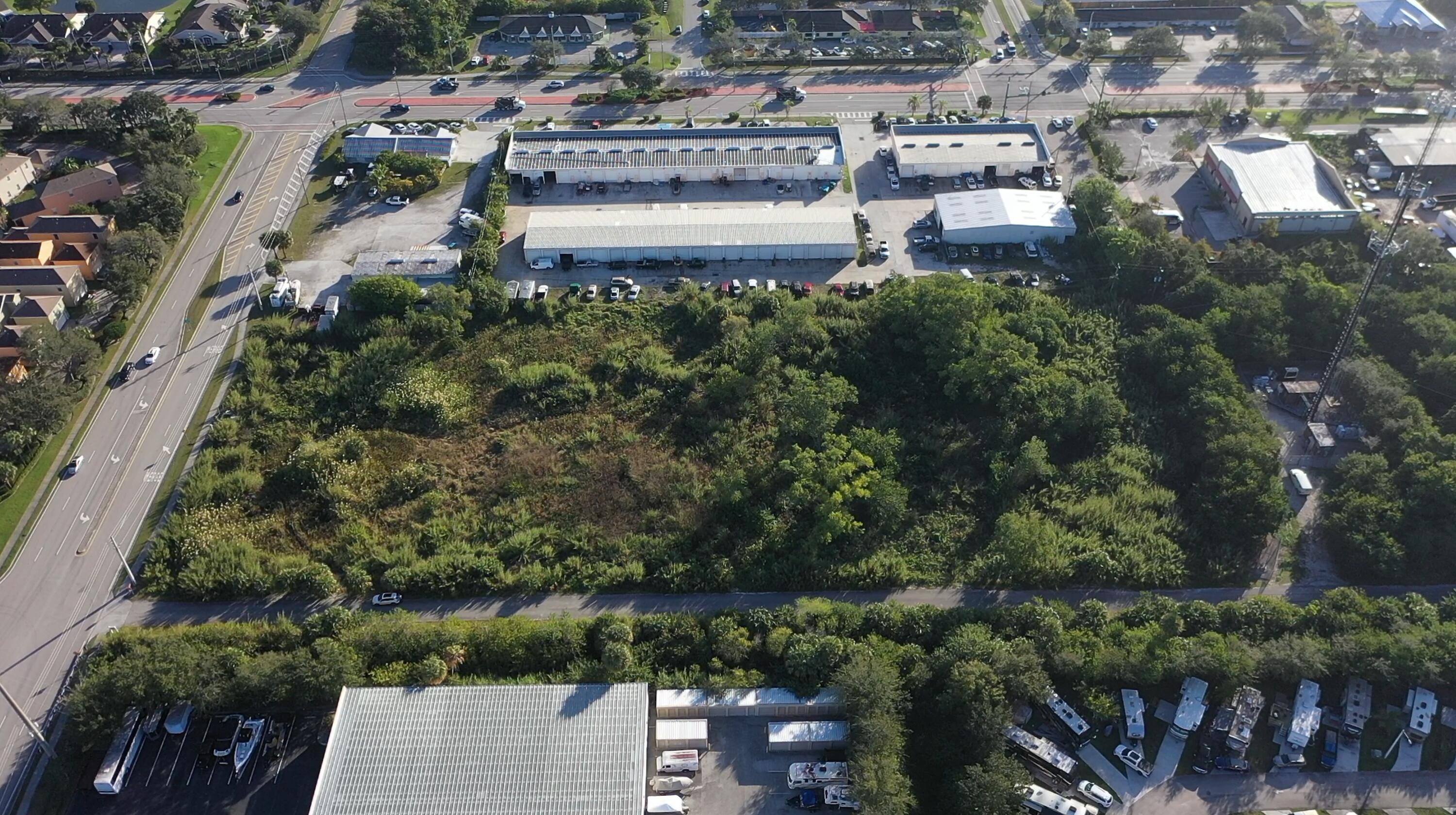 3775 Southeast Jennings Road Port St. Lucie, FL 34952 - Photo 7 of 14 an aerial view of multiple house
