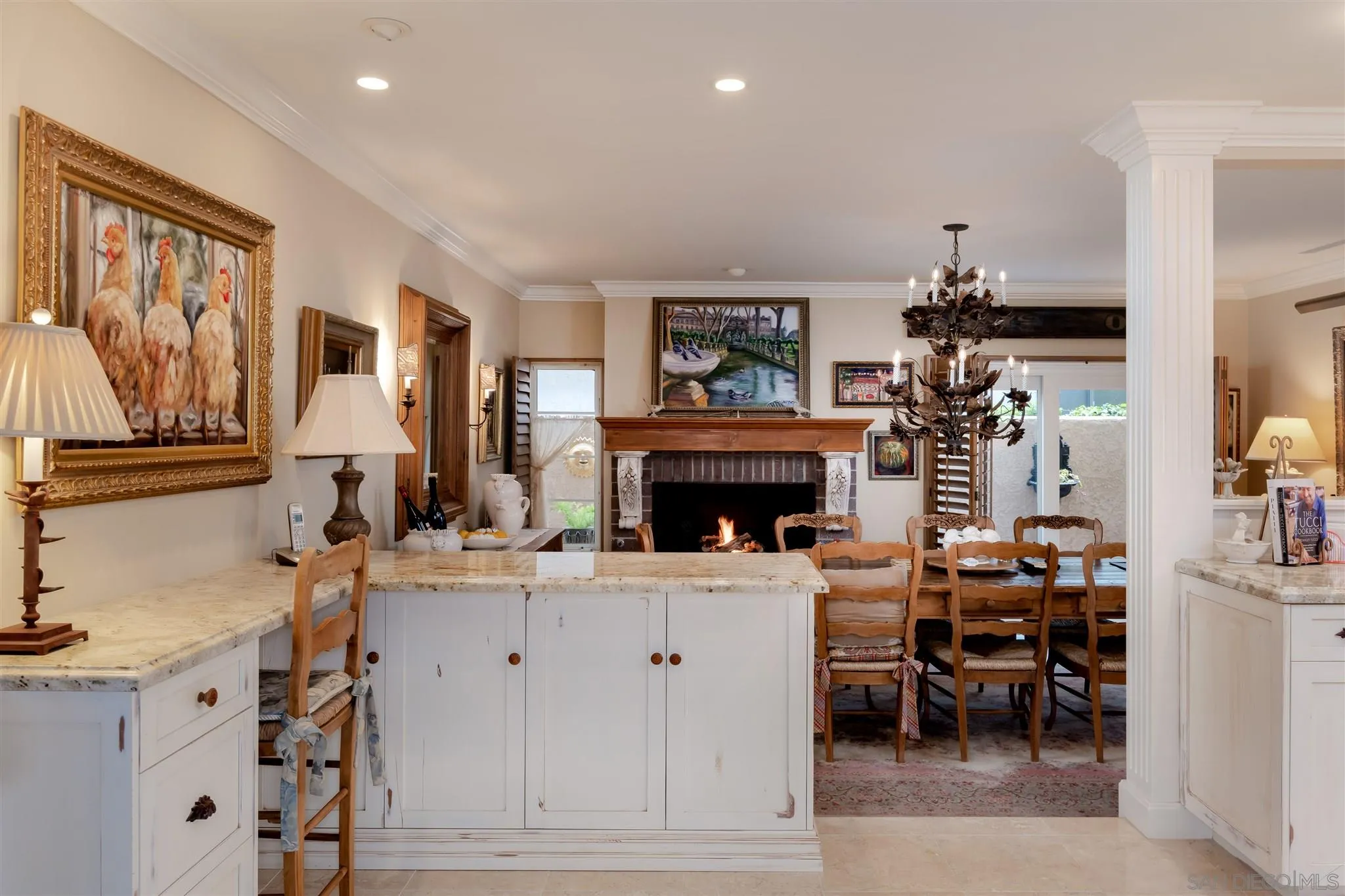 12 Buccaneer Way Coronado, CA 92118 - Photo 17 of 34 a living room with furniture a fireplace and a flat screen tv