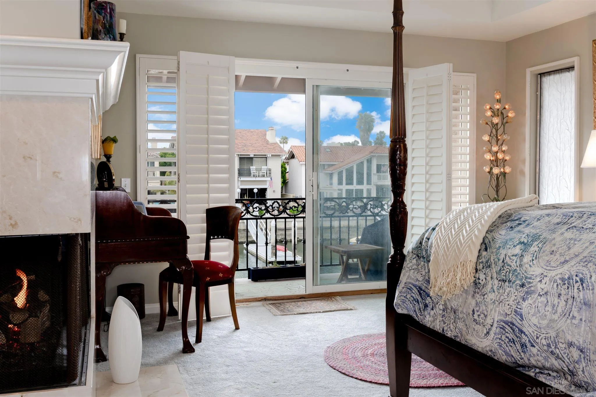 12 Buccaneer Way Coronado, CA 92118 - Photo 20 of 34 a bedroom with furniture and a large window