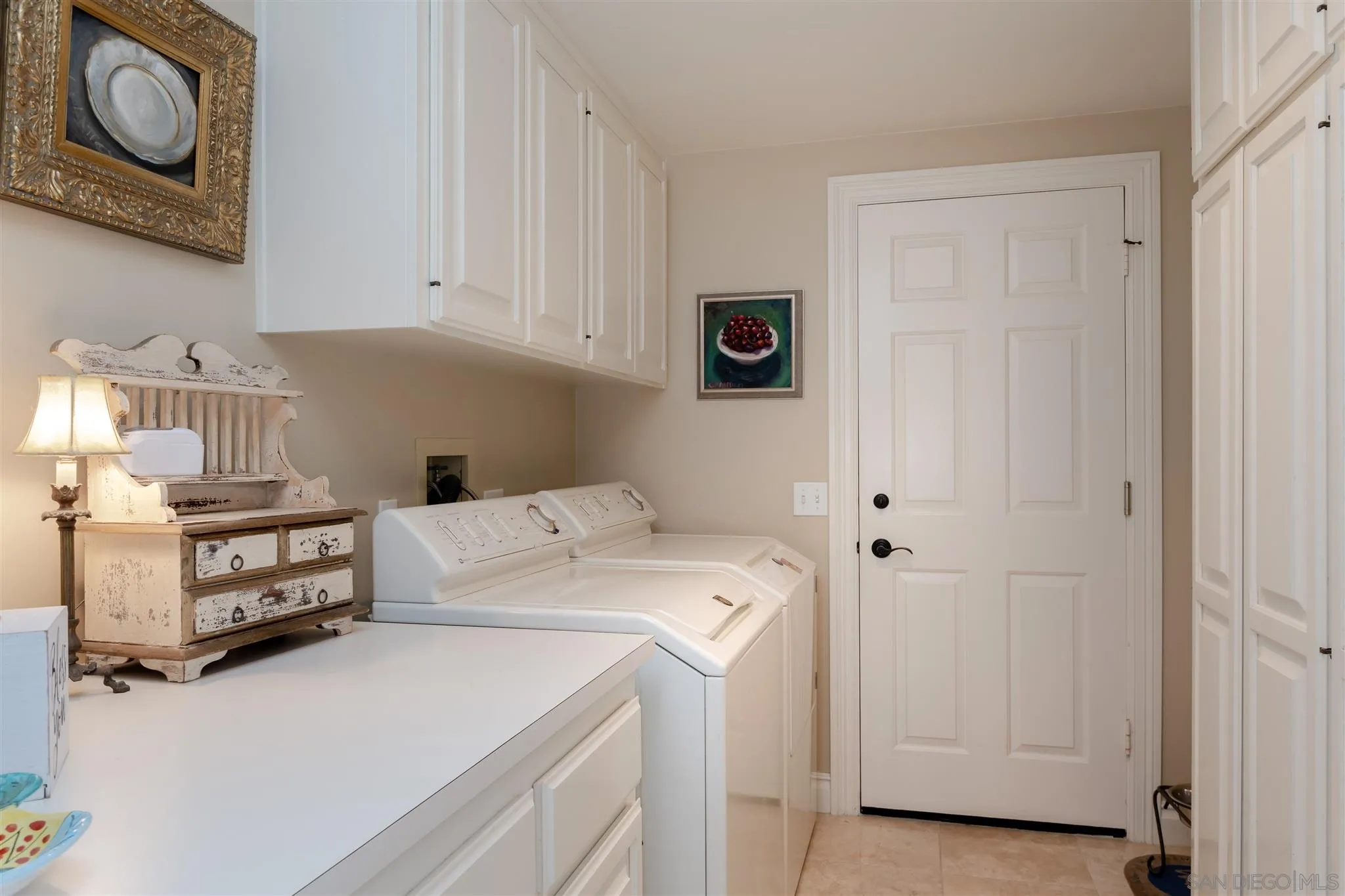 12 Buccaneer Way Coronado, CA 92118 - Photo 27 of 34 a utility room with dryer and washer