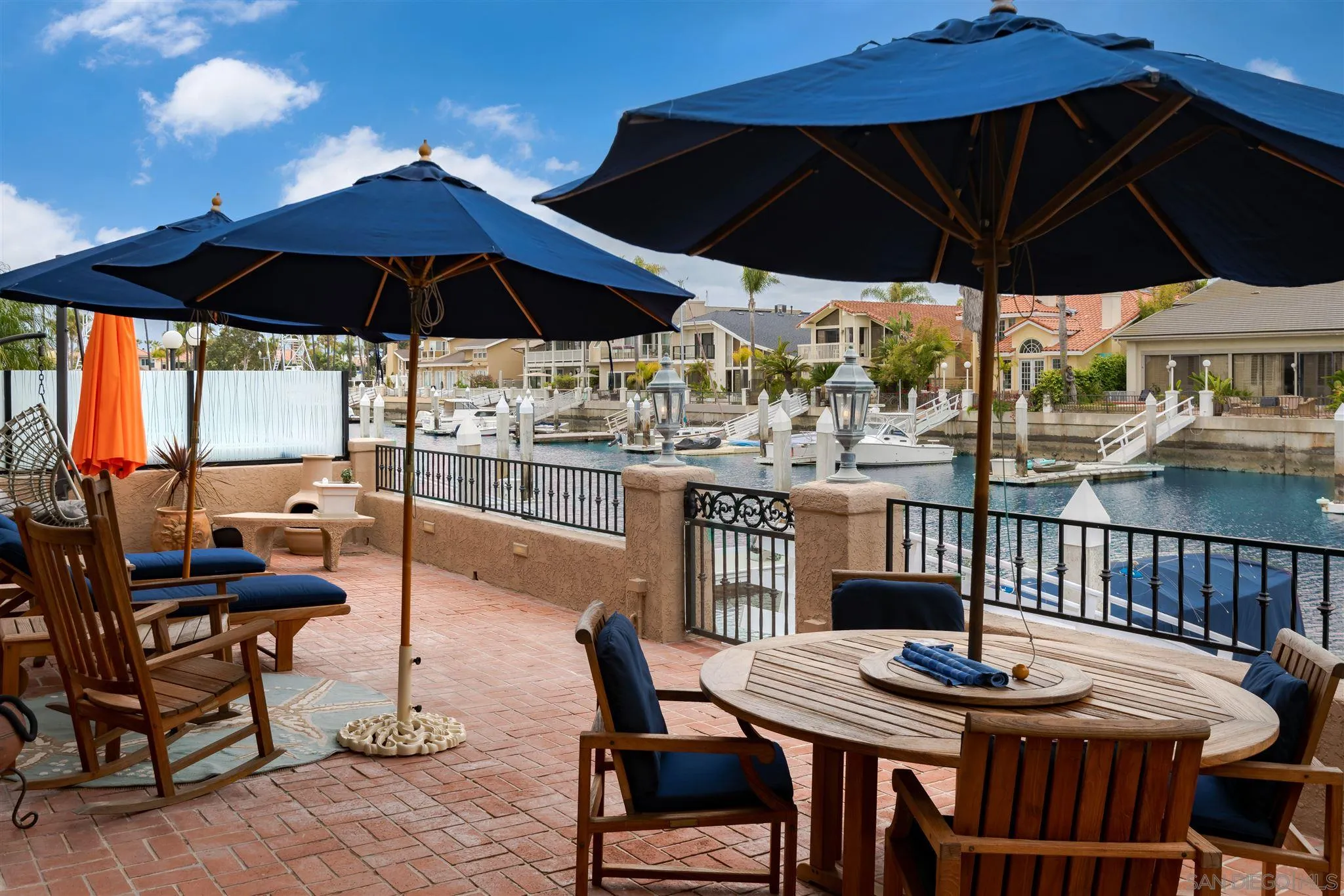12 Buccaneer Way Coronado, CA 92118 - Photo 30 of 34 a table and chairs in the patio