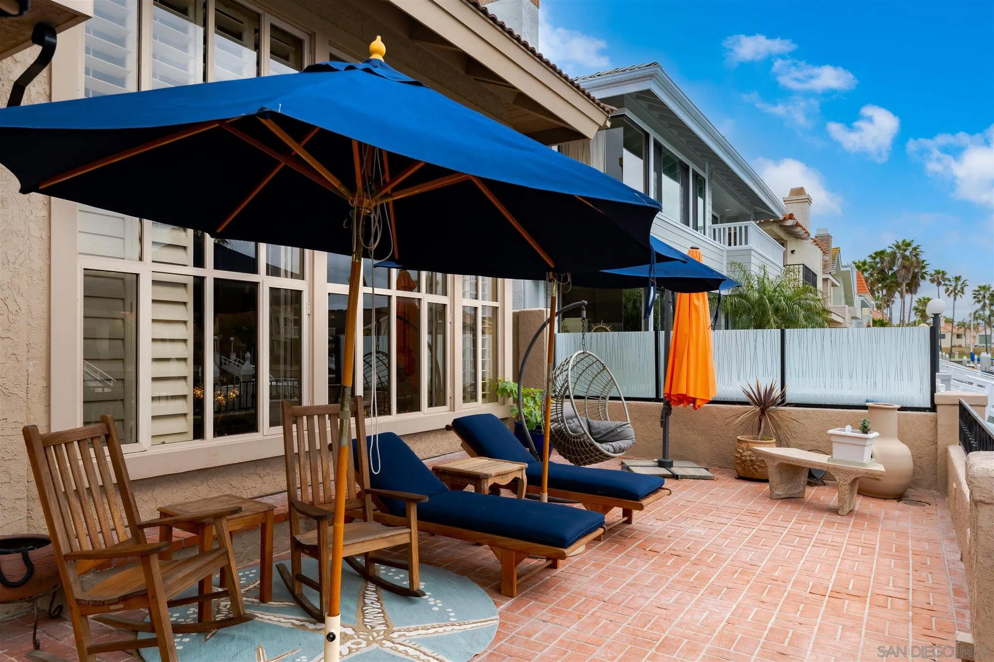 12 Buccaneer Way Coronado, CA 92118 - Photo 33 of 34 a patio with patio a couch and chairs