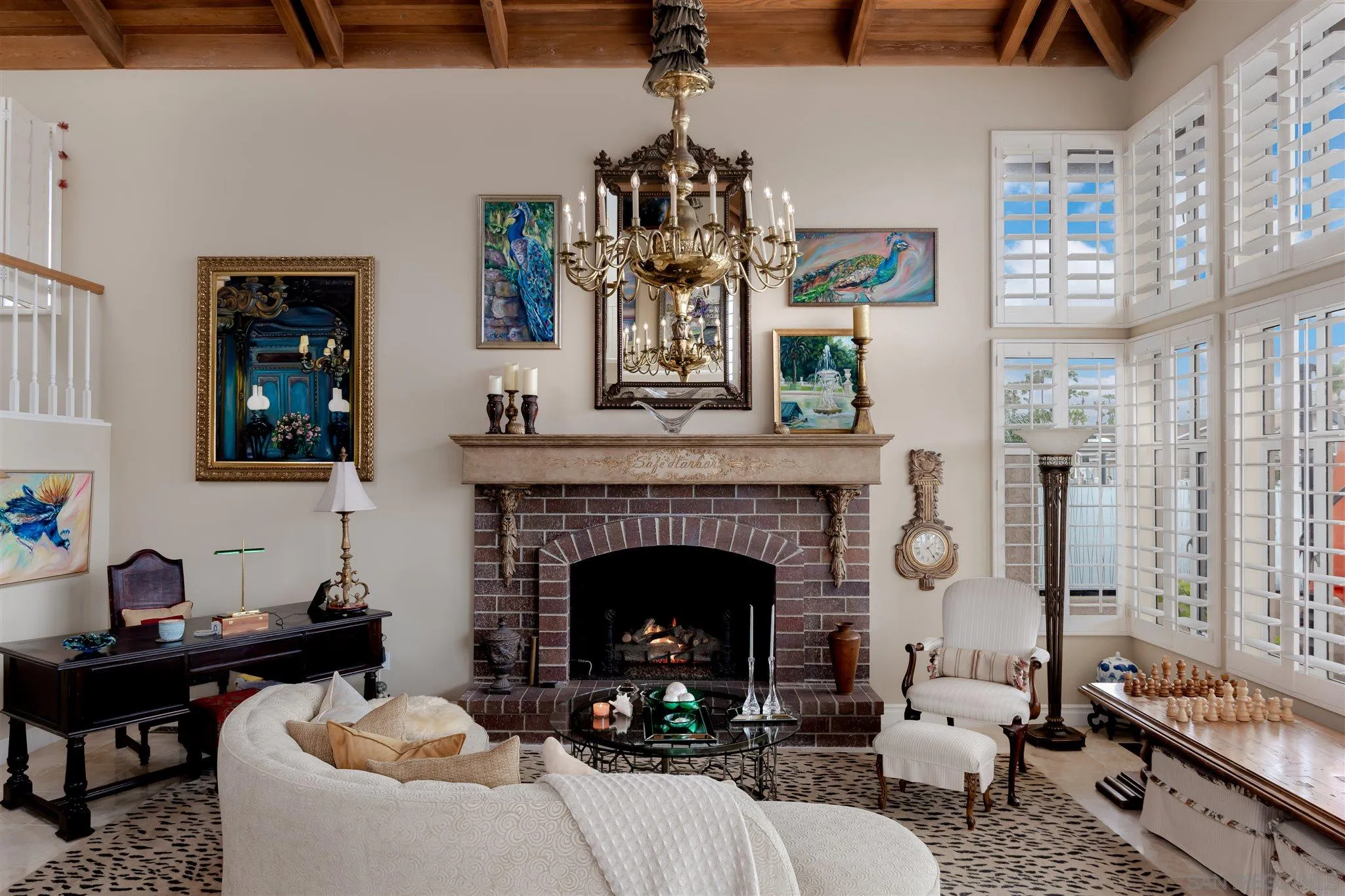 12 Buccaneer Way Coronado, CA 92118 - Photo 4 of 34 a living room with furniture potted plant and a fireplace